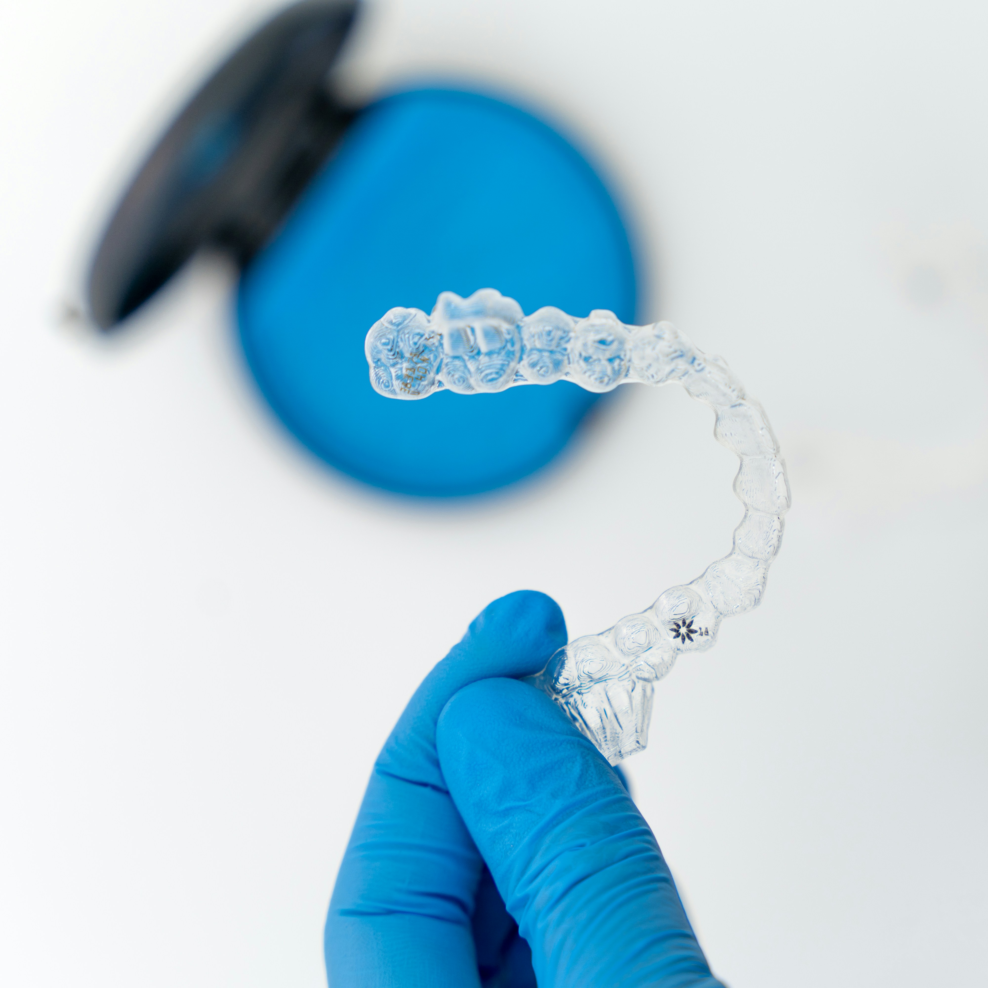 Clear Invisalign aligner trays for discreet orthodontic treatment